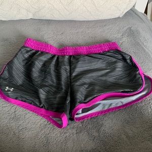 Woman’s black and purple striped small under armour shorts